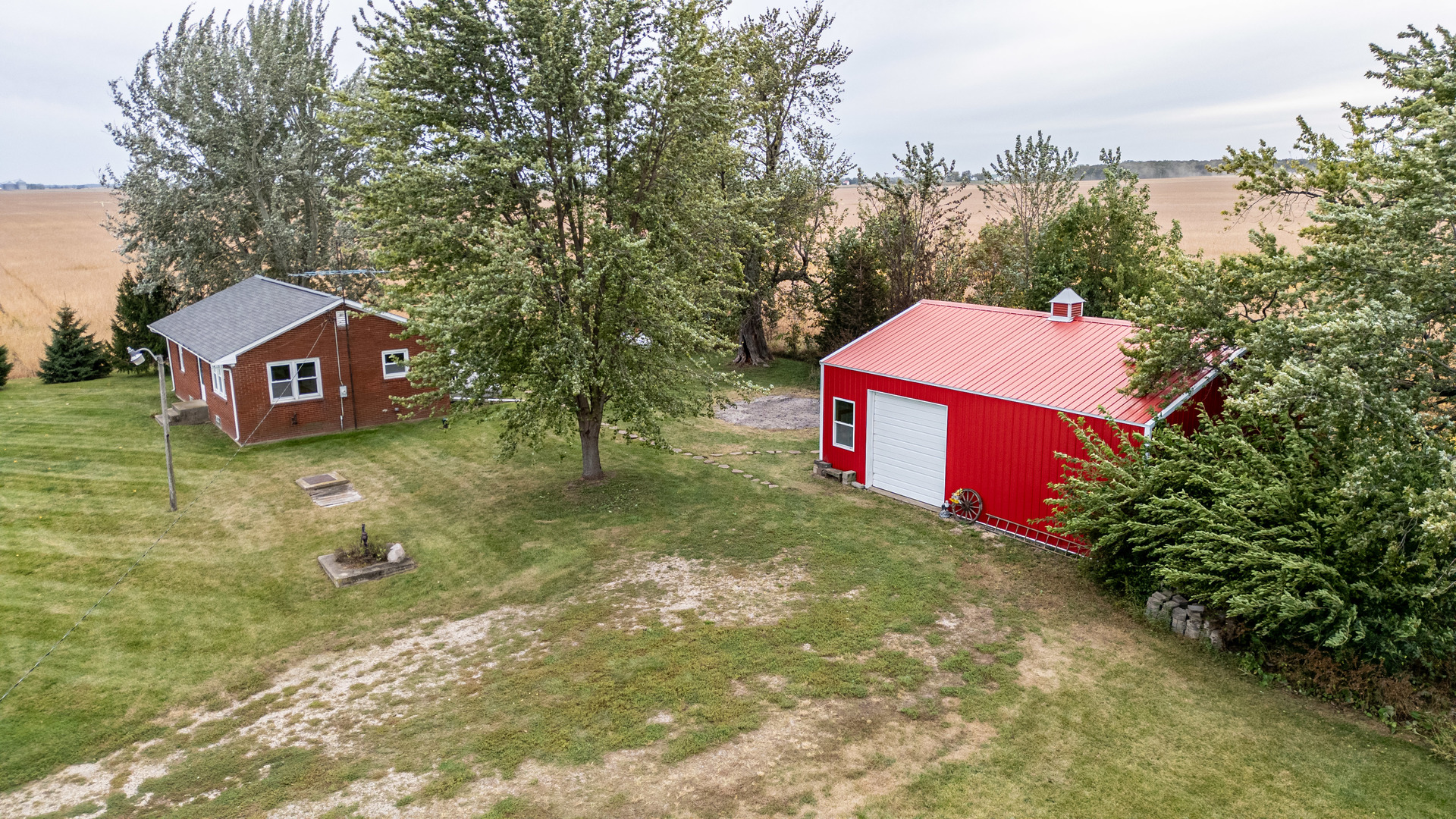 4705 East 7th Road Earlville, IL 60518 - Photo 13 of 21 a pathway of a house with a yard