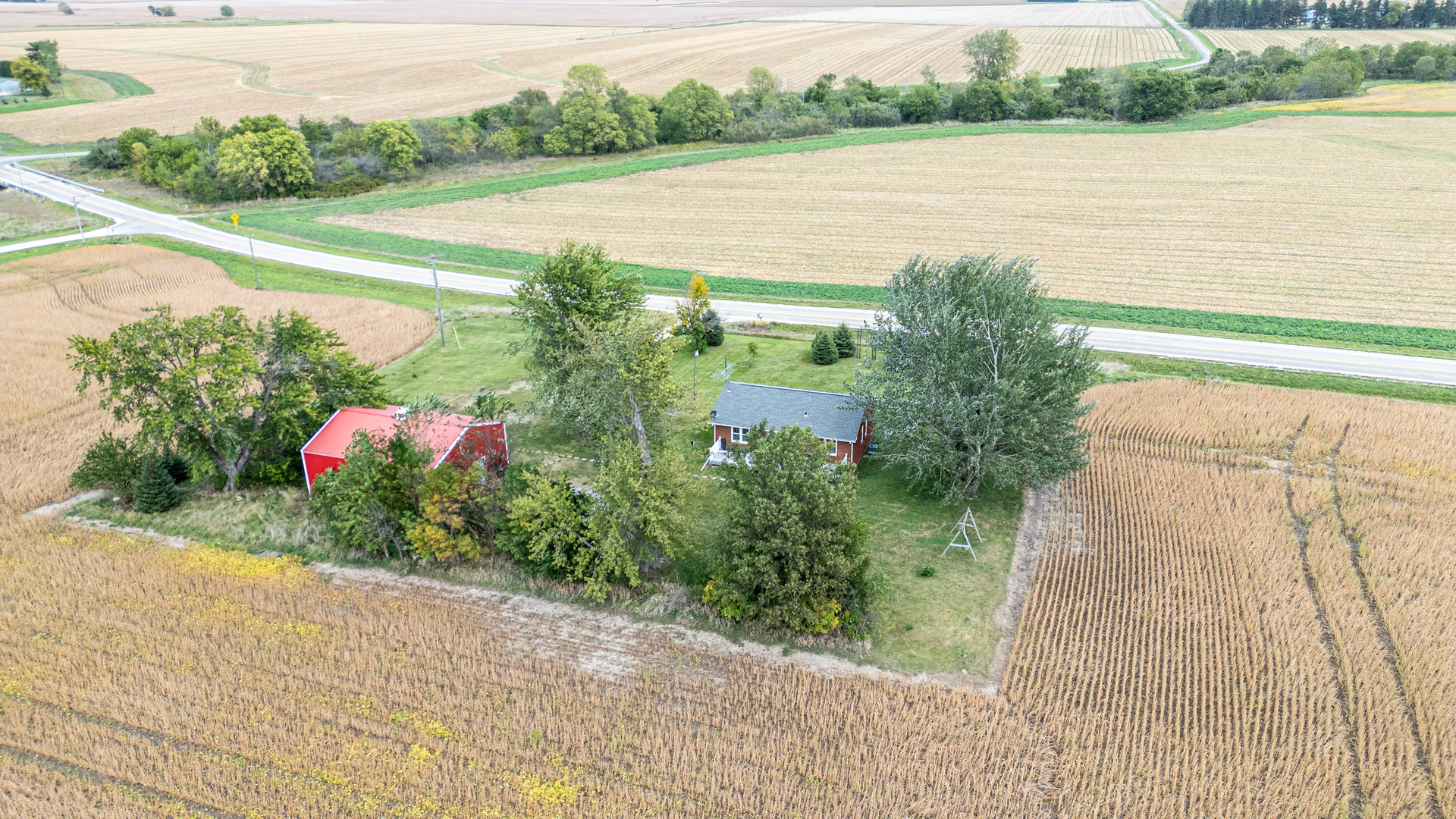 4705 East 7th Road Earlville, IL 60518 - Photo 19 of 21 a view of a lake with a big yard