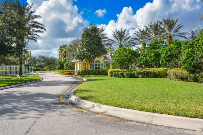 10673 Southwest Stratton Drive Port St. Lucie, FL 34987 - Photo 38 of 39 Man Gated Entrance