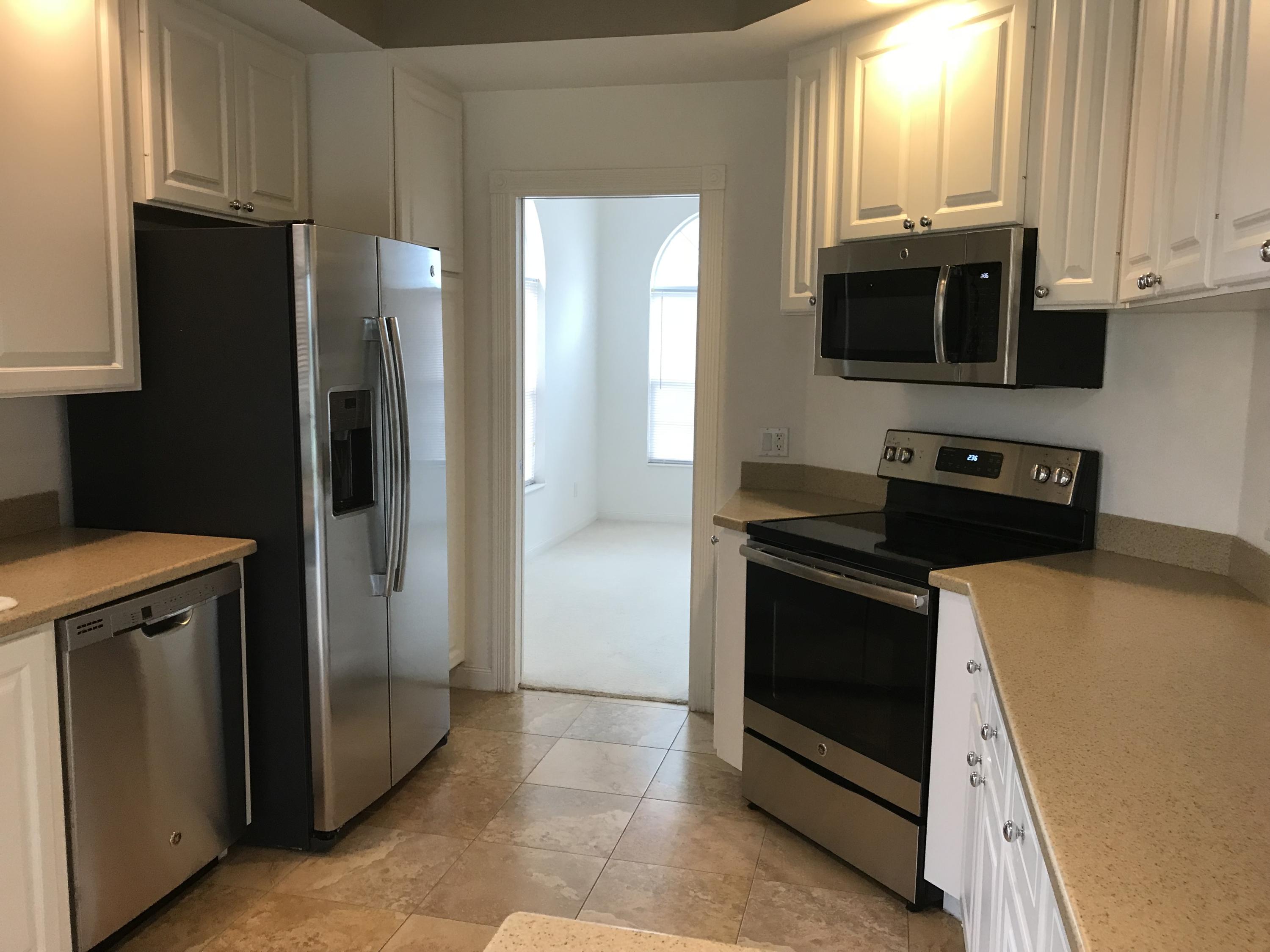 10673 Southwest Stratton Drive Port St. Lucie, FL 34987 - Photo 9 of 39 Kitchen