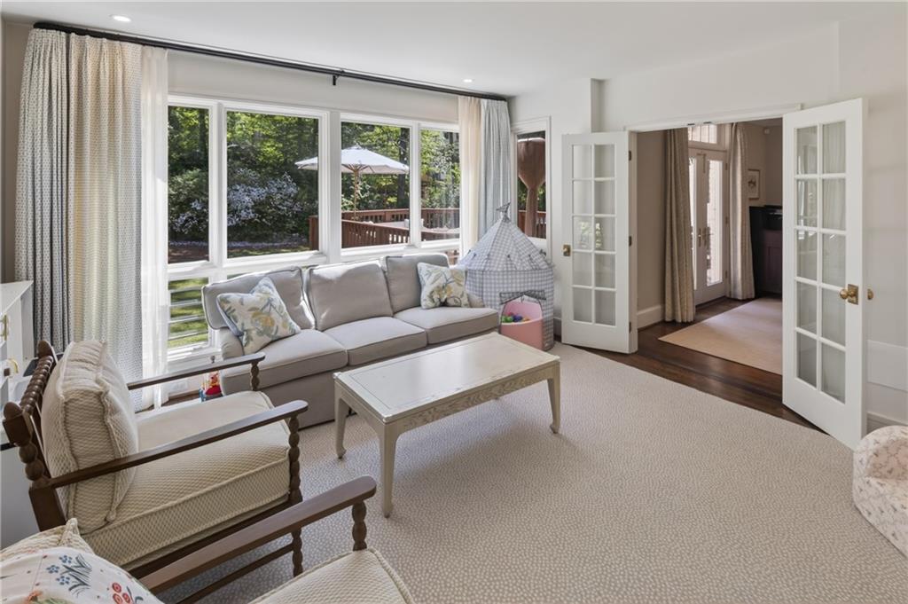 755 Greenview Avenue Northeast Atlanta, GA 30305 - Photo 22 of 28 a living room with furniture and a large window