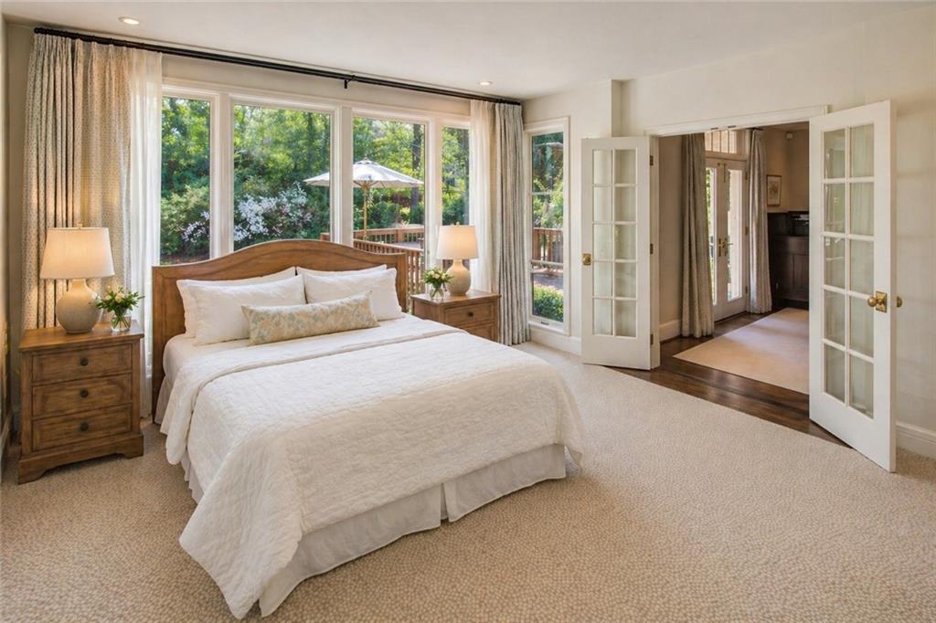 755 Greenview Avenue Northeast Atlanta, GA 30305 - Photo 23 of 28 a bedroom with a large bed and a large window
