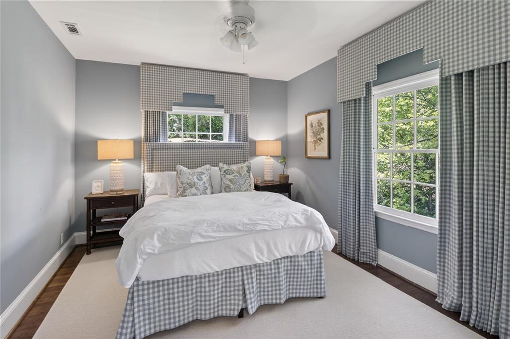 755 Greenview Avenue Northeast Atlanta, GA 30305 - Photo 24 of 28 a bedroom with a bed and window