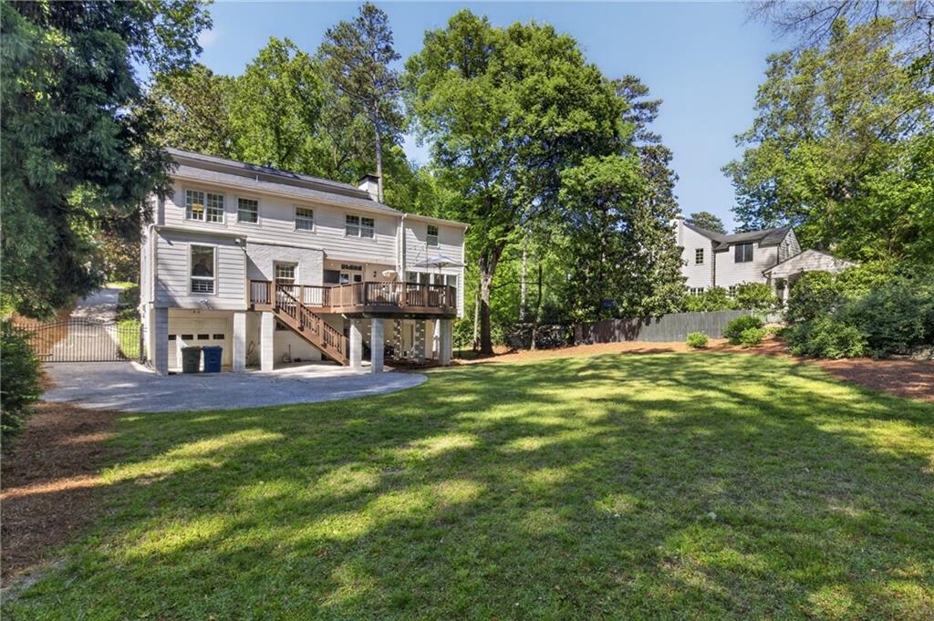755 Greenview Avenue Northeast Atlanta, GA 30305 - Photo 27 of 28 a view of a house with a yard and sitting area
