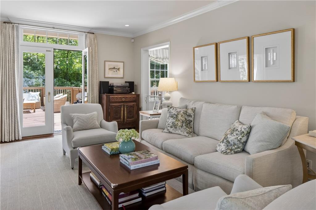 755 Greenview Avenue Northeast Atlanta, GA 30305 - Photo 5 of 28 a living room with furniture and a large window