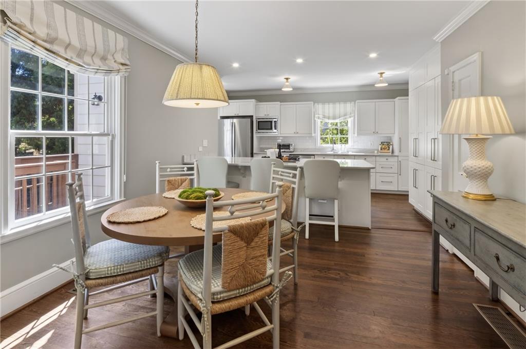 755 Greenview Avenue Northeast Atlanta, GA 30305 - Photo 6 of 28 a dining room with furniture a window and kitchen view