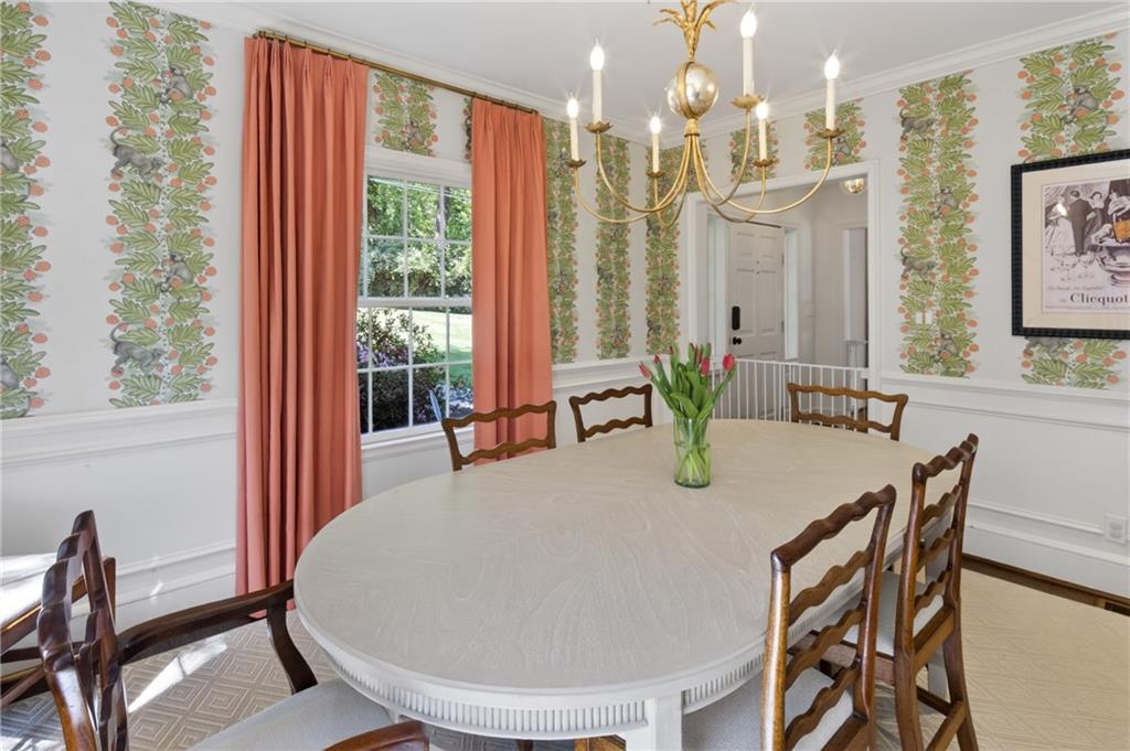 755 Greenview Avenue Northeast Atlanta, GA 30305 - Photo 10 of 28 a dining room with furniture and wooden floor