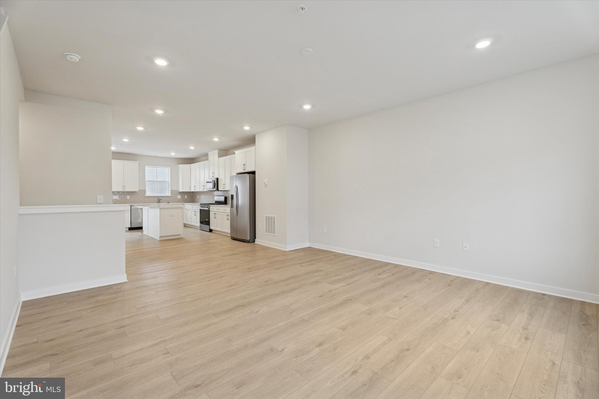 19 East Front Street Bridgeport, PA 19405 - Photo 11 of 25 a view of kitchen with refrigerator and window
