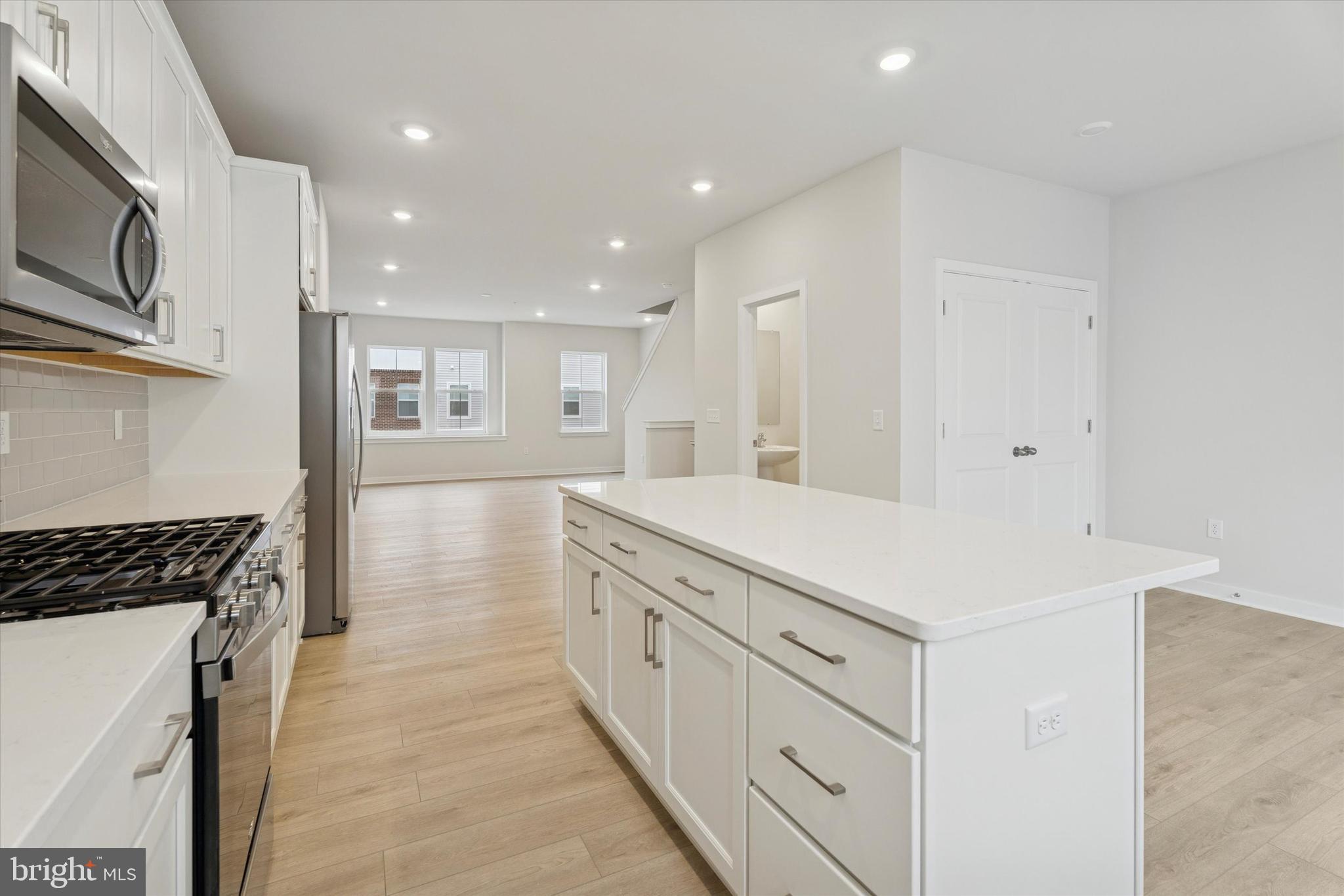 19 East Front Street Bridgeport, PA 19405 - Photo 8 of 25 a kitchen with cabinets and a stove