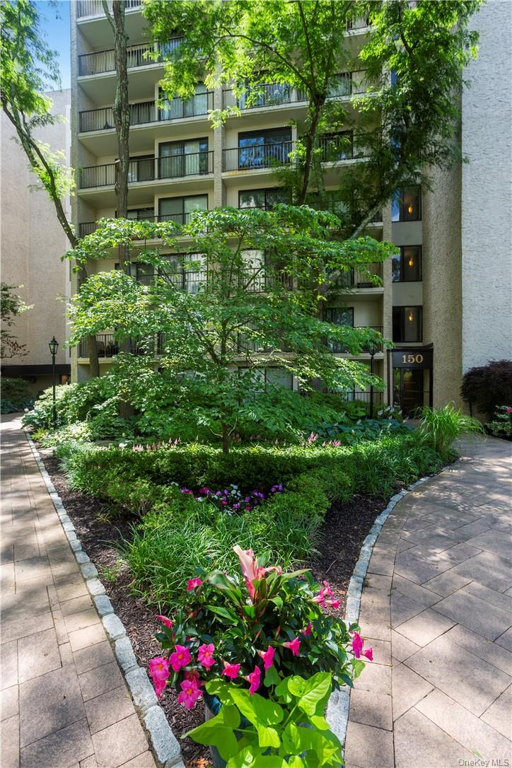 150 Overlook Avenue, Unit 2K Peekskill, NY 10566 - Photo 12 of 26 a view of a garden with flowers