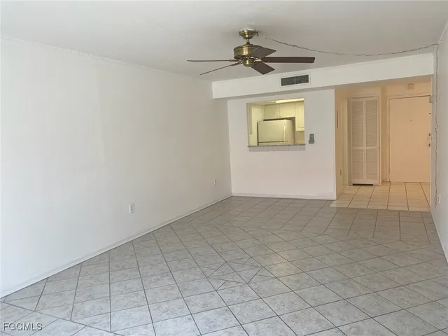 en empty room with windows