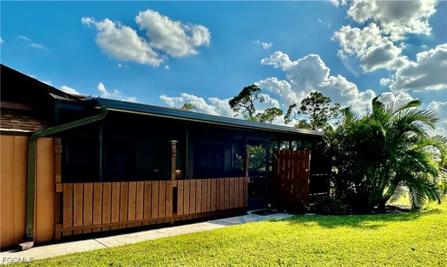 a view of a backyard of the house