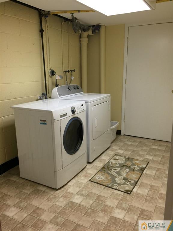 163 Normandy Road Colonia, NJ 07067 - Photo 11 of 14 a utility room with dryer and washer