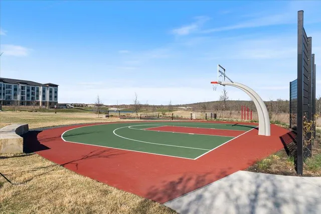 a view of a swimming pool with seating area