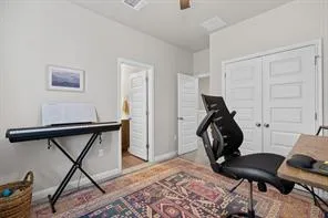 a view of room with furniture and wooden floor