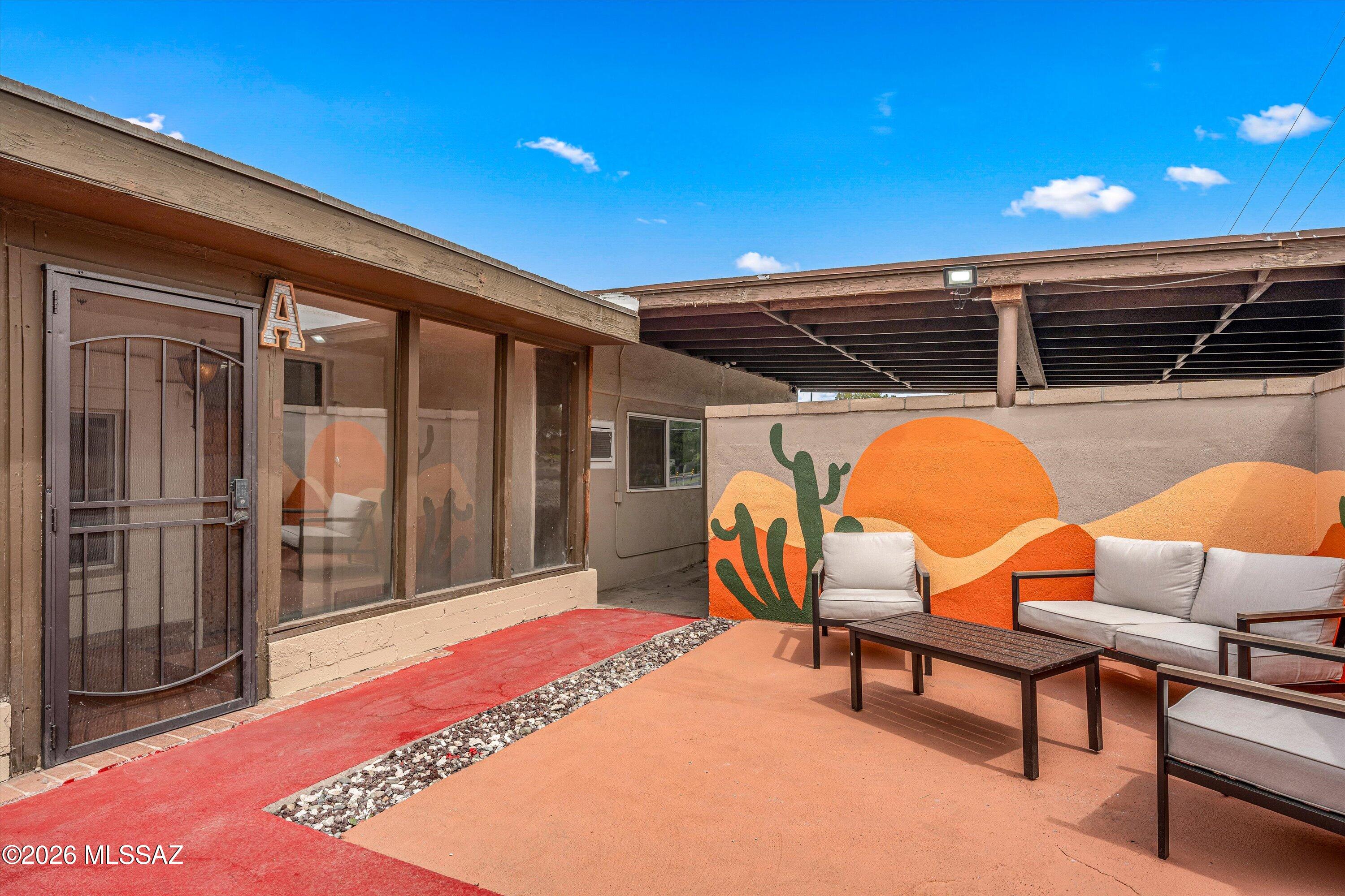 2619 East Prince Road Tucson, AZ 85716 - Photo 12 of 50 a view of a chairs and table in the patio