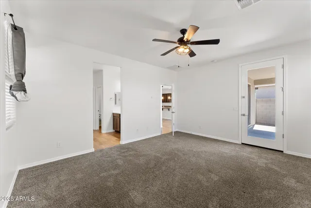 a bathroom with a double vanity sink and mirror