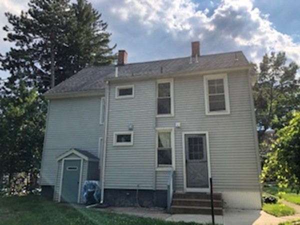 655-657 Hampden Street Holyoke, MA 01040 - Photo 3 of 3 a front view of a house with garden