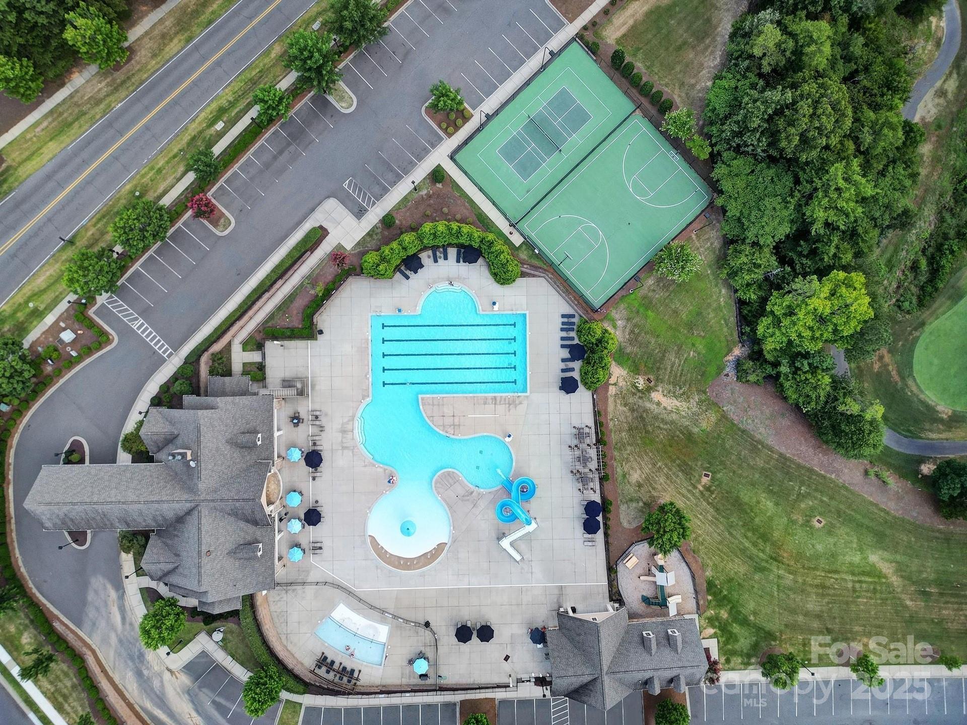 17237 Rider Wood Lane Charlotte, NC 28278 - Photo 43 of 43 a backyard of a house with lots of green space