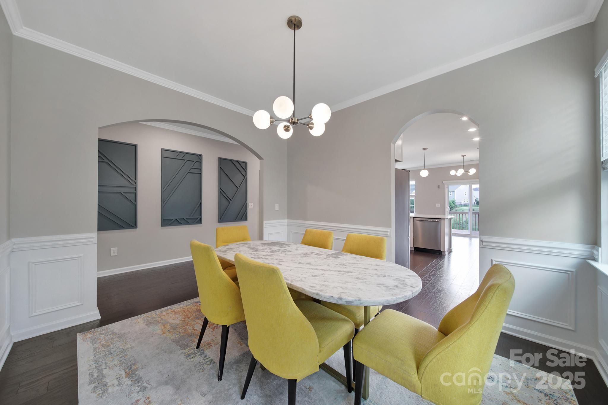 17237 Rider Wood Lane Charlotte, NC 28278 - Photo 6 of 43 a view of a dining room with furniture and wooden floor