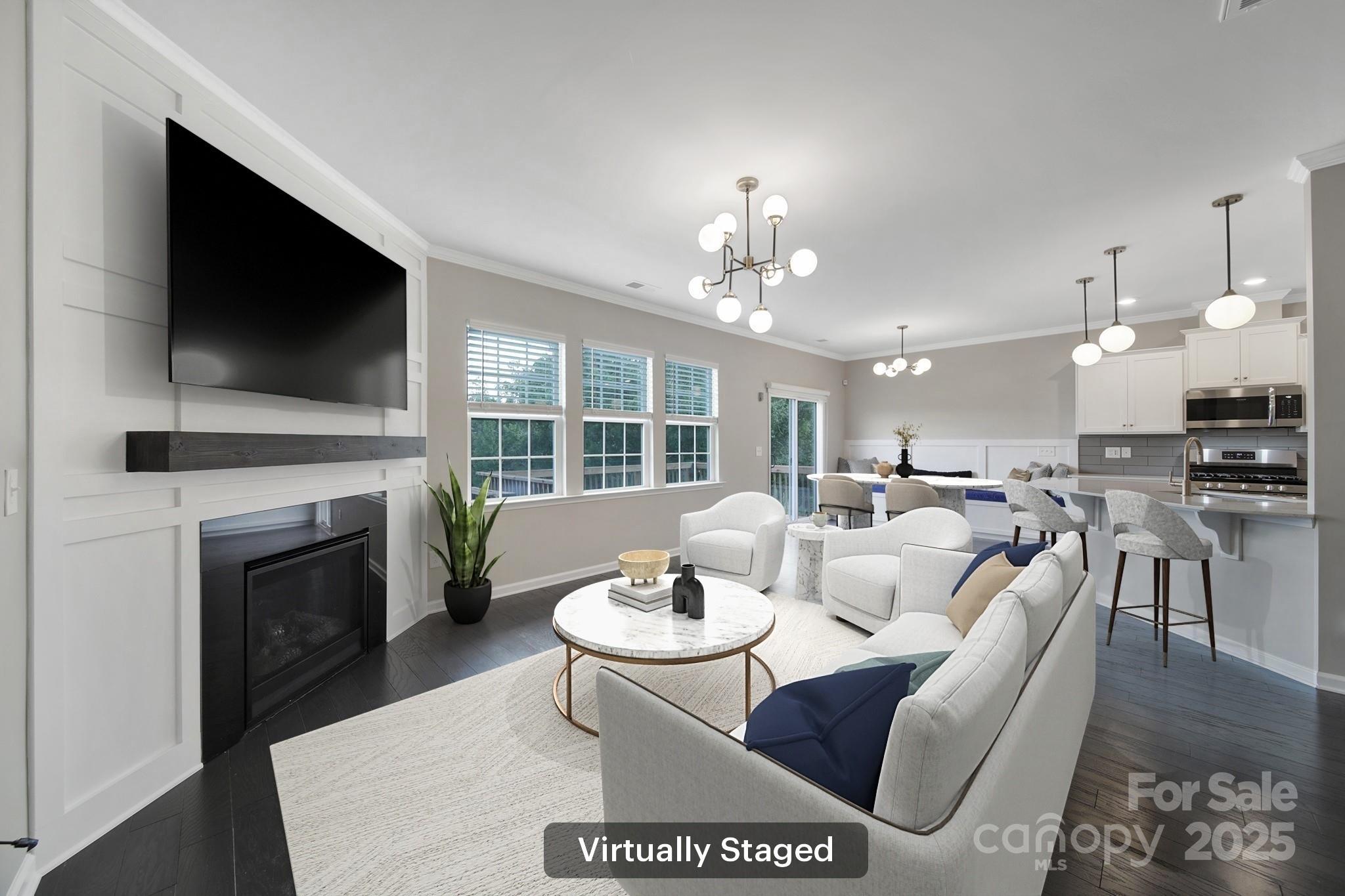 17237 Rider Wood Lane Charlotte, NC 28278 - Photo 7 of 43 a living room with furniture a fireplace and a flat screen tv