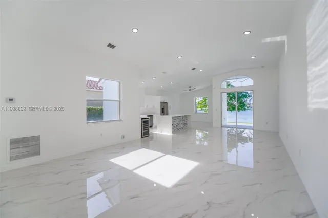 a bathroom with a sink and a large mirror