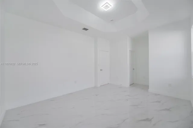 a bathroom with a bathtub and sink