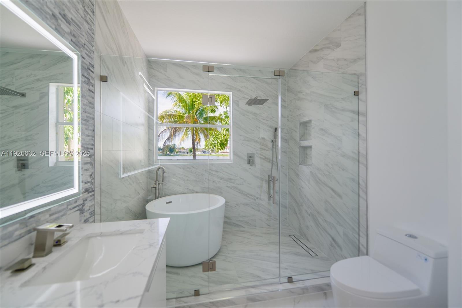5290 Southwest 134th Avenue Miramar, FL 33027 - Photo 17 of 44 a bathroom with a bathtub and sink