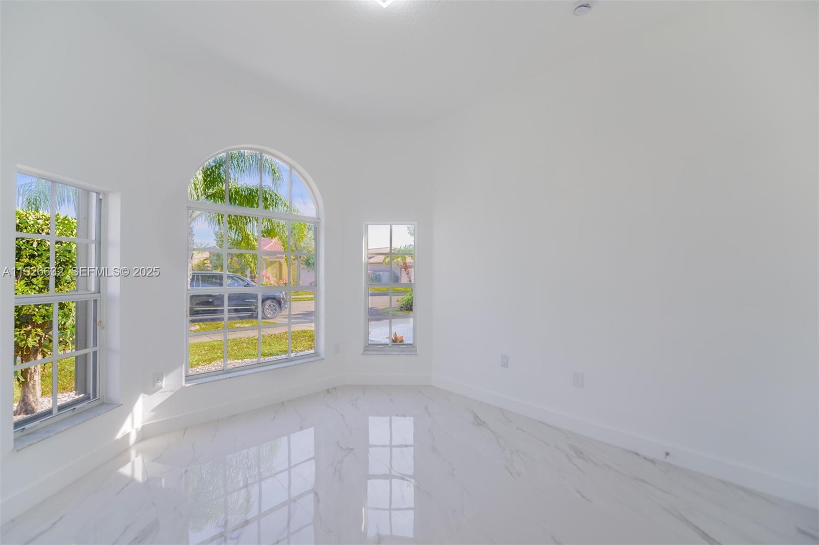 5290 Southwest 134th Avenue Miramar, FL 33027 - Photo 20 of 44 an empty room with windows
