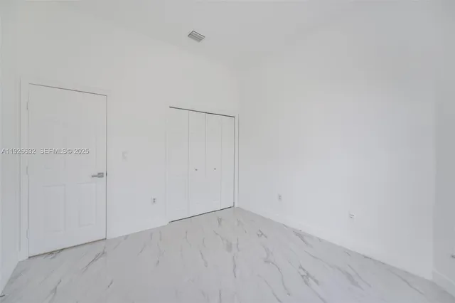 a view of empty room with window