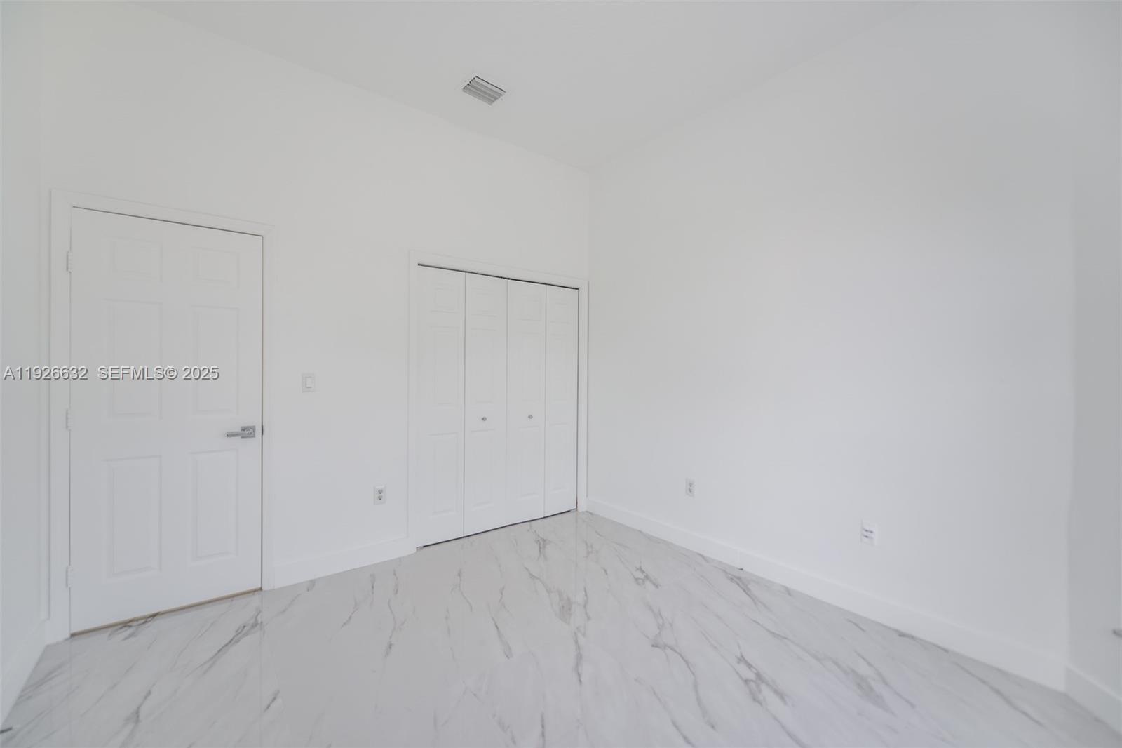 5290 Southwest 134th Avenue Miramar, FL 33027 - Photo 21 of 44 wooden floor in an empty room