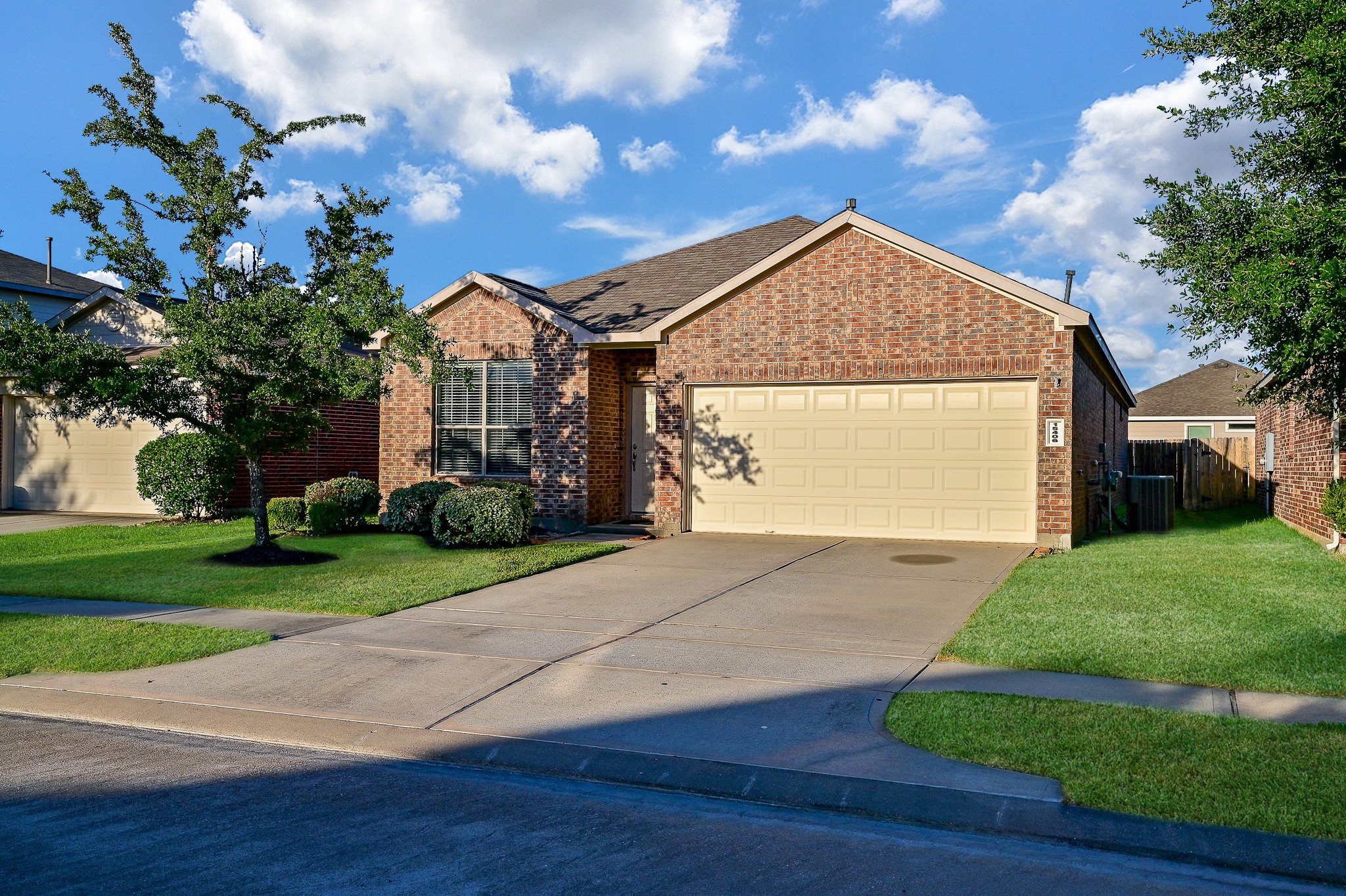 15406 Key Crest Lane Cypress, TX 77429 - Photo 1 of 47 a view of a house with a yard