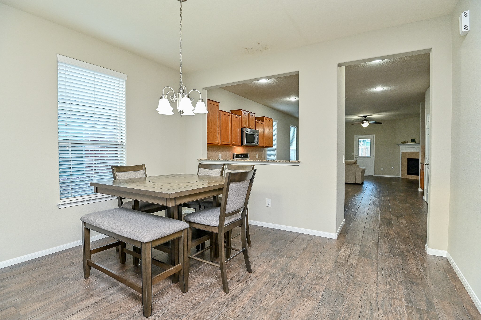 15406 Key Crest Lane Cypress, TX 77429 - Photo 11 of 47 a view of a dining room with furniture and wooden floor