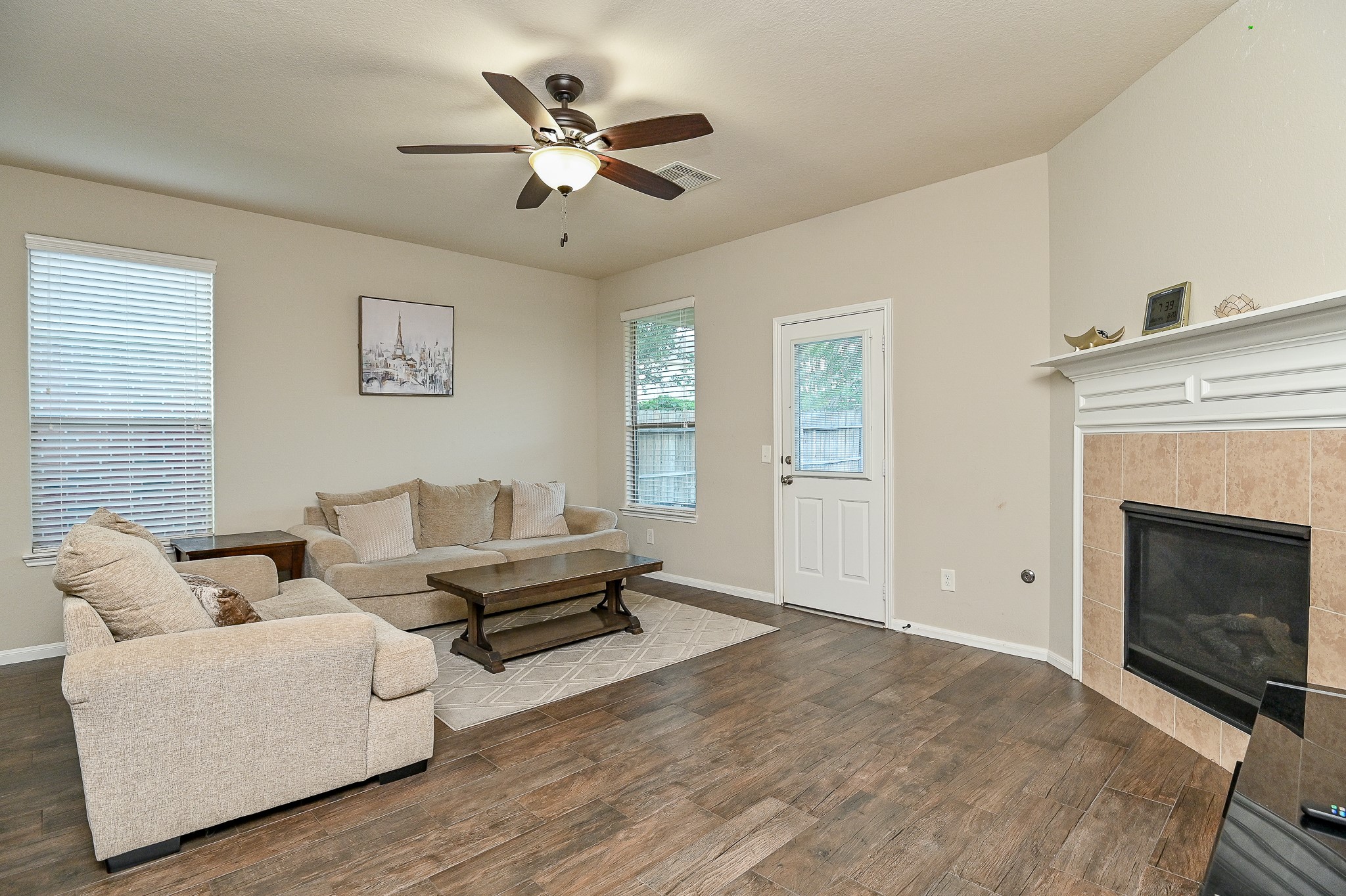 15406 Key Crest Lane Cypress, TX 77429 - Photo 22 of 47 a living room with furniture and a fireplace