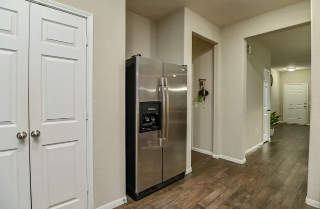 a view of a bathroom with a glass shower door