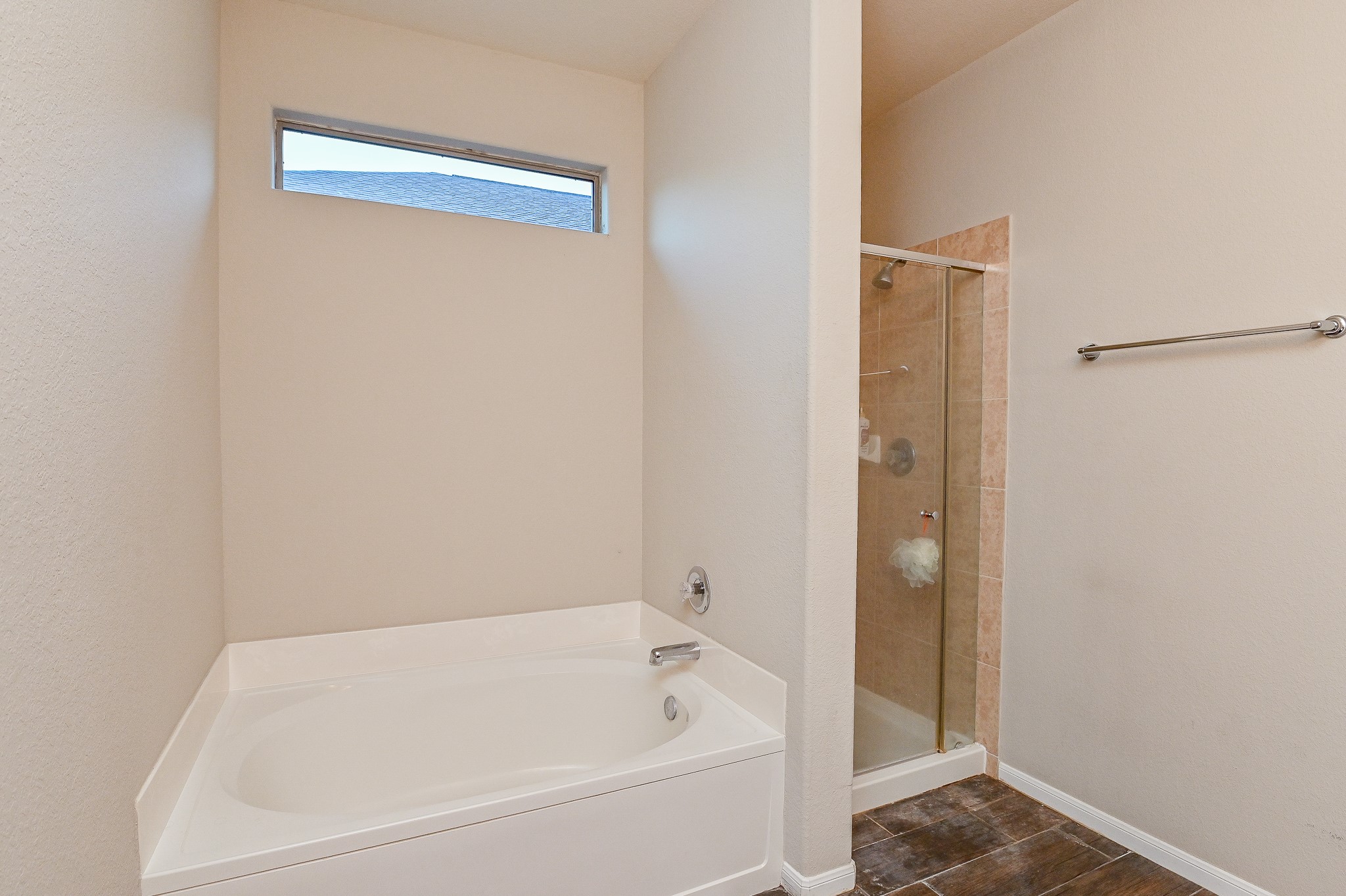 15406 Key Crest Lane Cypress, TX 77429 - Photo 37 of 47 a white bath tub sitting next to a white sink