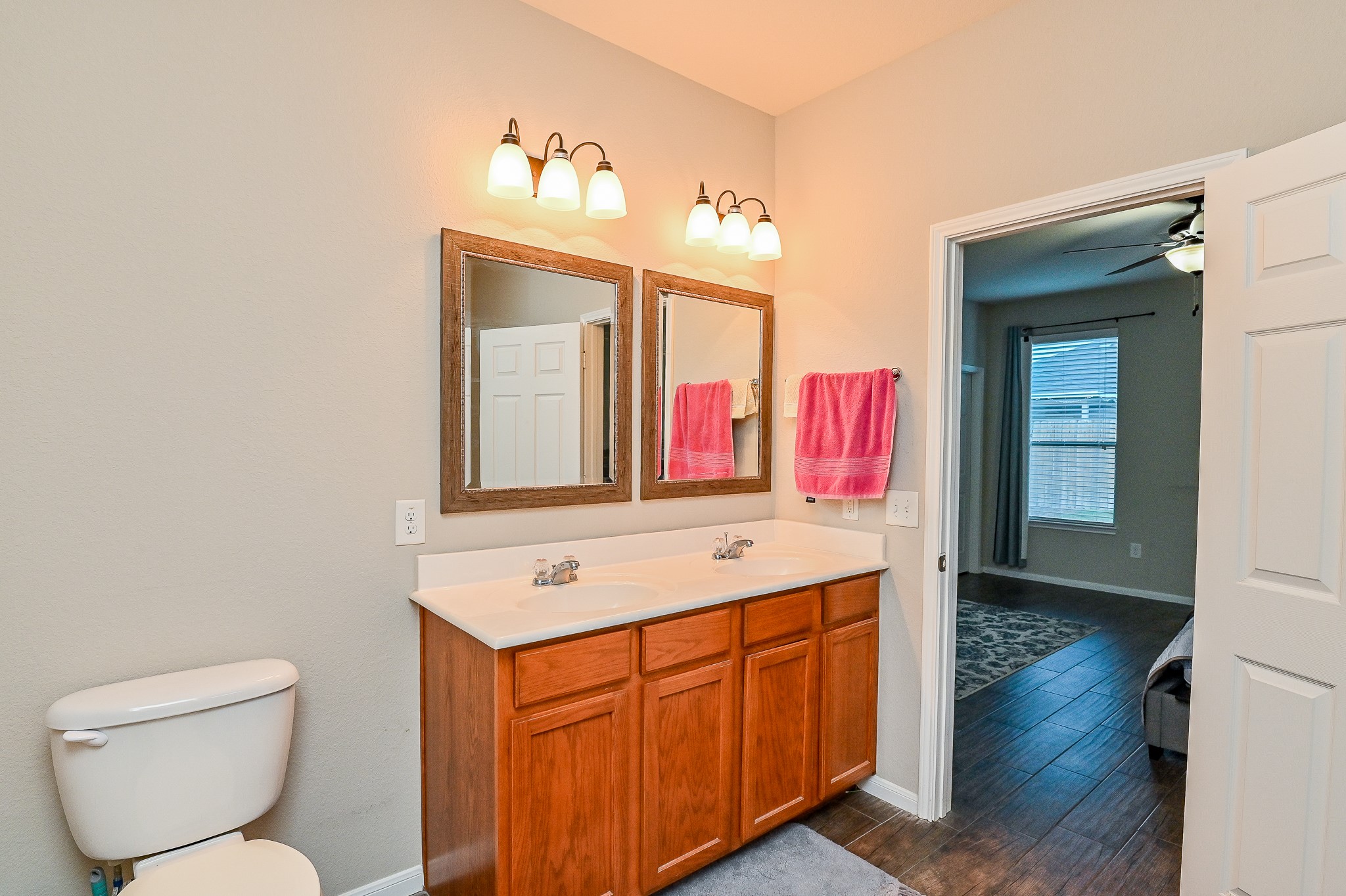 15406 Key Crest Lane Cypress, TX 77429 - Photo 38 of 47 a bathroom with a sink vanity and mirror