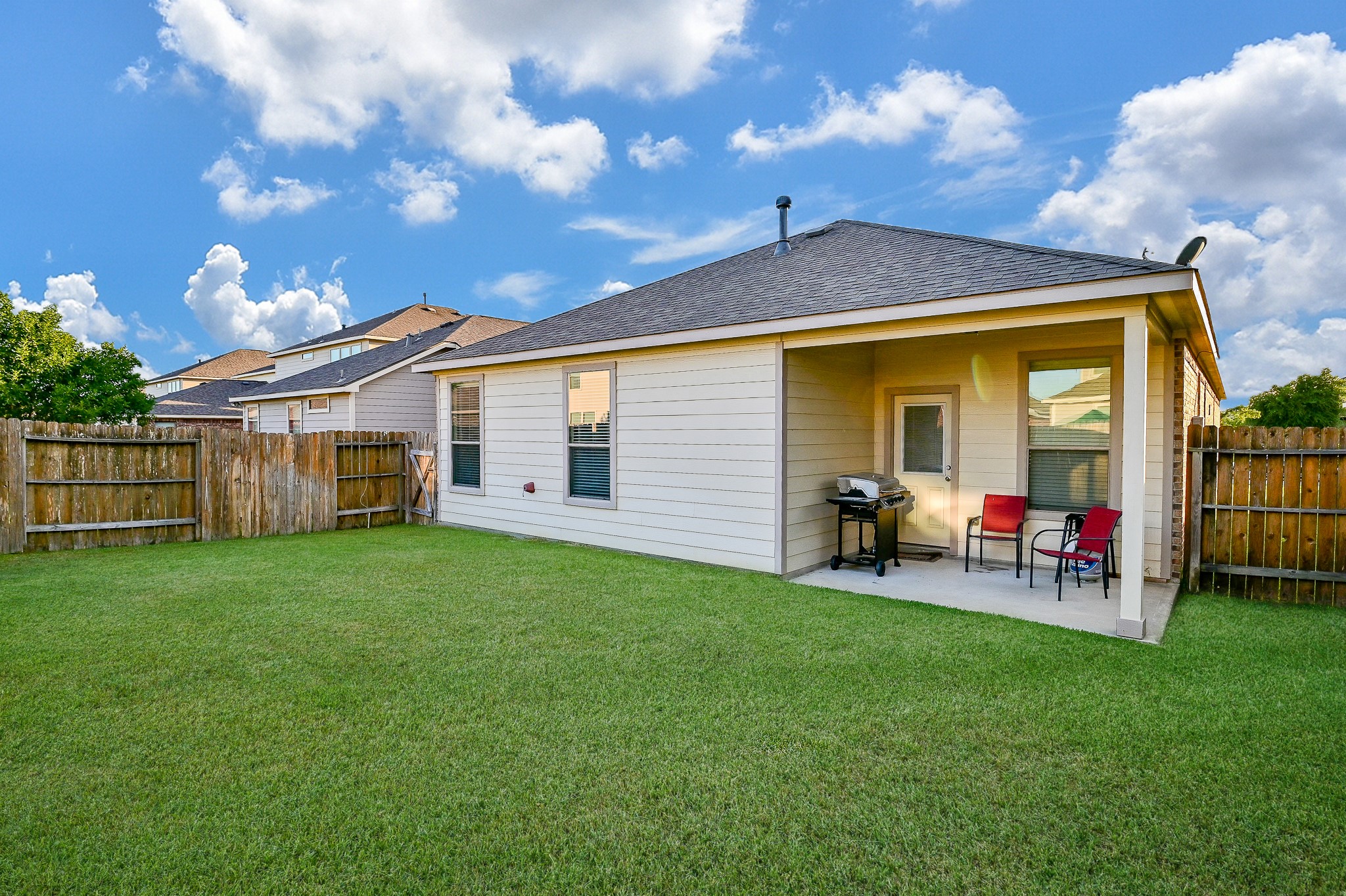 15406 Key Crest Lane Cypress, TX 77429 - Photo 39 of 47 a view of a house with backyard and porch