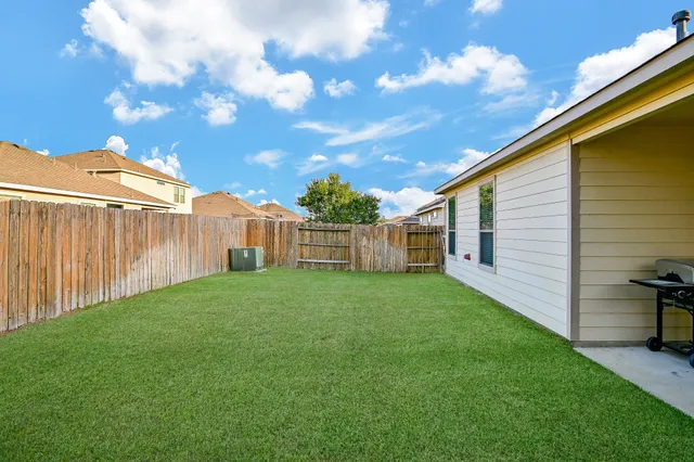 a view of a backyard with a garden