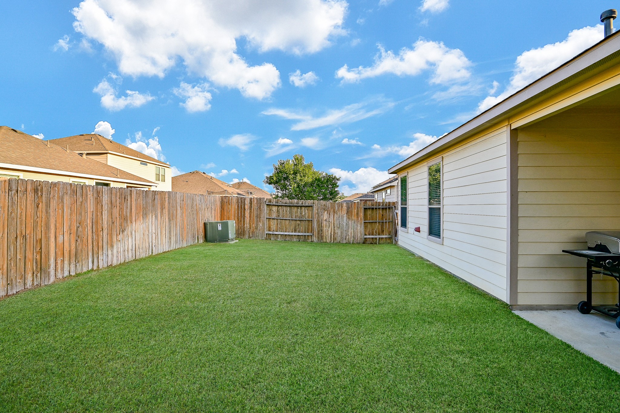 15406 Key Crest Lane Cypress, TX 77429 - Photo 40 of 47 a view of a backyard with a garden