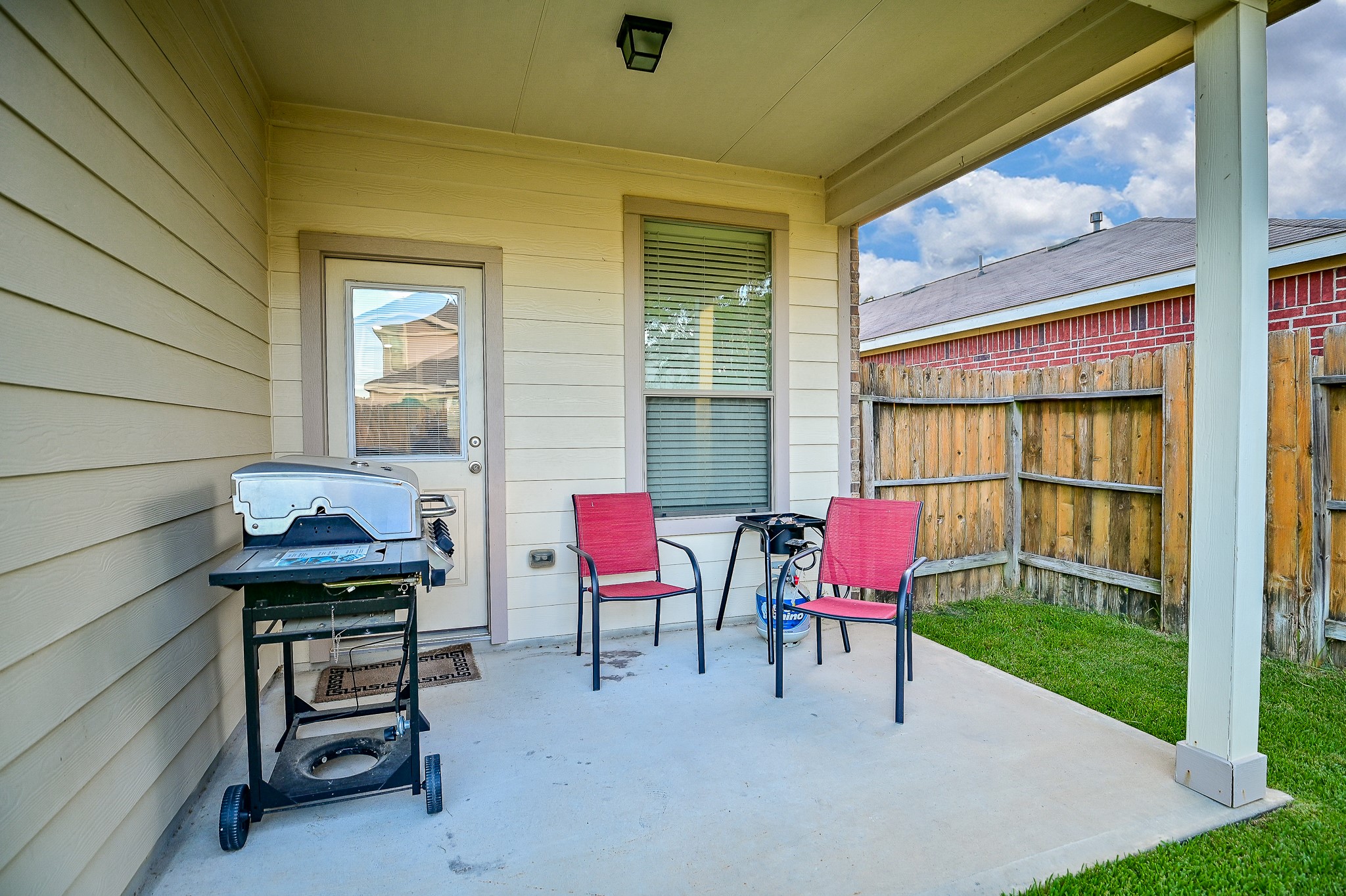 15406 Key Crest Lane Cypress, TX 77429 - Photo 42 of 47 a view of a patio with a table and chairs