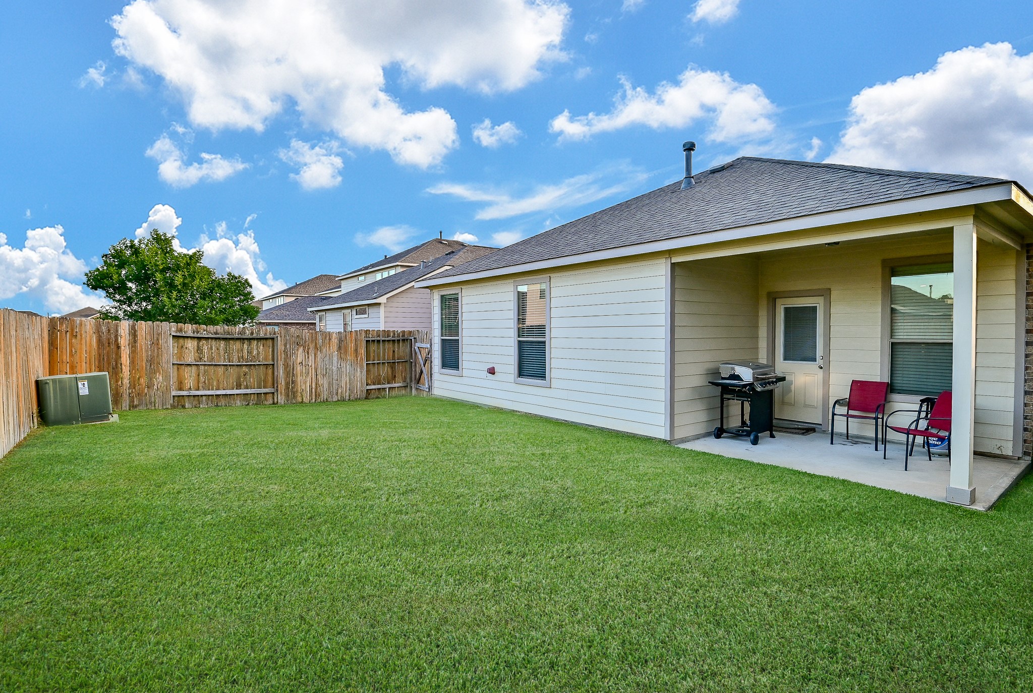 15406 Key Crest Lane Cypress, TX 77429 - Photo 47 of 47 a view of a house with a backyard and porch