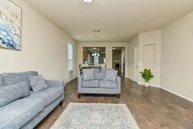 a living room with furniture and a couch