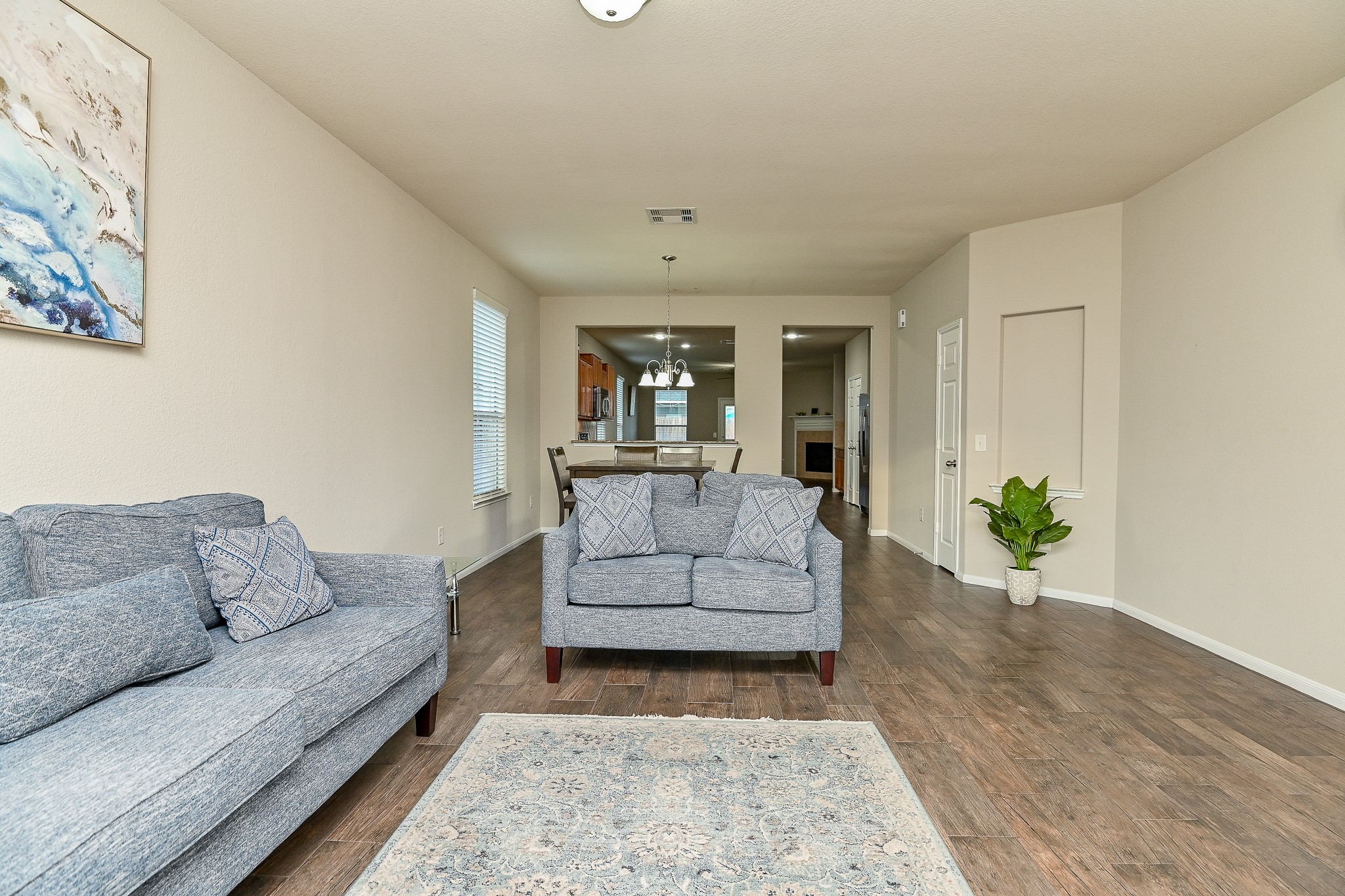 15406 Key Crest Lane Cypress, TX 77429 - Photo 9 of 47 a living room with furniture and a couch