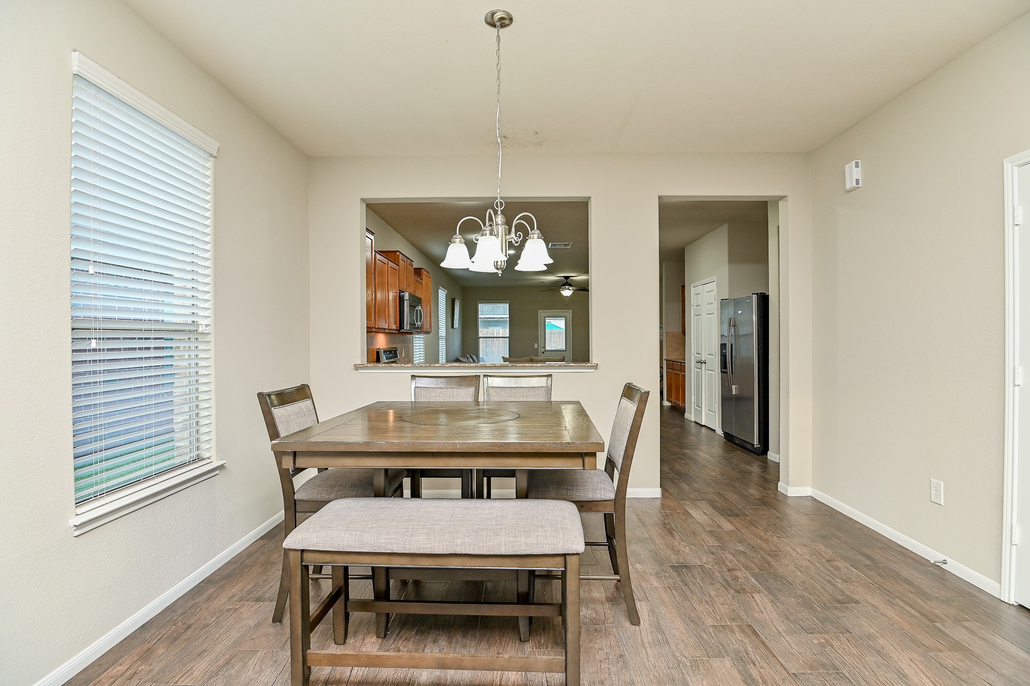 15406 Key Crest Lane Cypress, TX 77429 - Photo 10 of 47 a view of a dining room with furniture and window