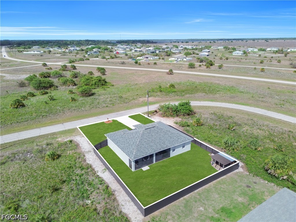 384 Neighborly Road LaBelle, FL 33935 - Photo 38 of 45 a view of an outdoor space with a lake view