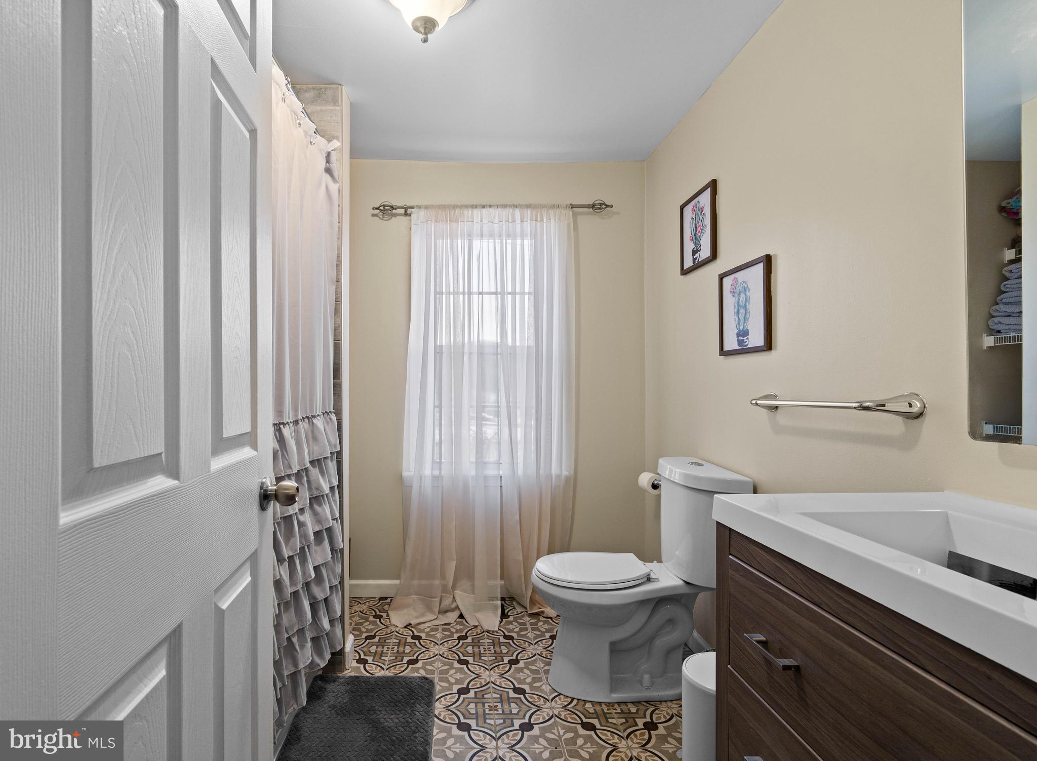197 Ridge Street Smokerun, PA 16681 - Photo 32 of 47 a white toilet sitting next to a bathroom sink