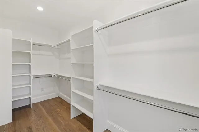 a view of an empty walk in closet