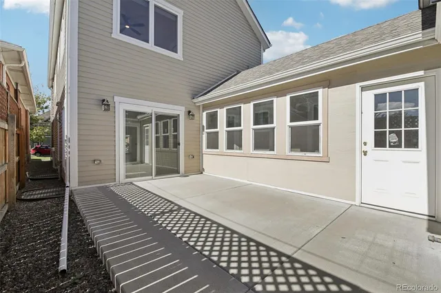 a view of a house with a large window