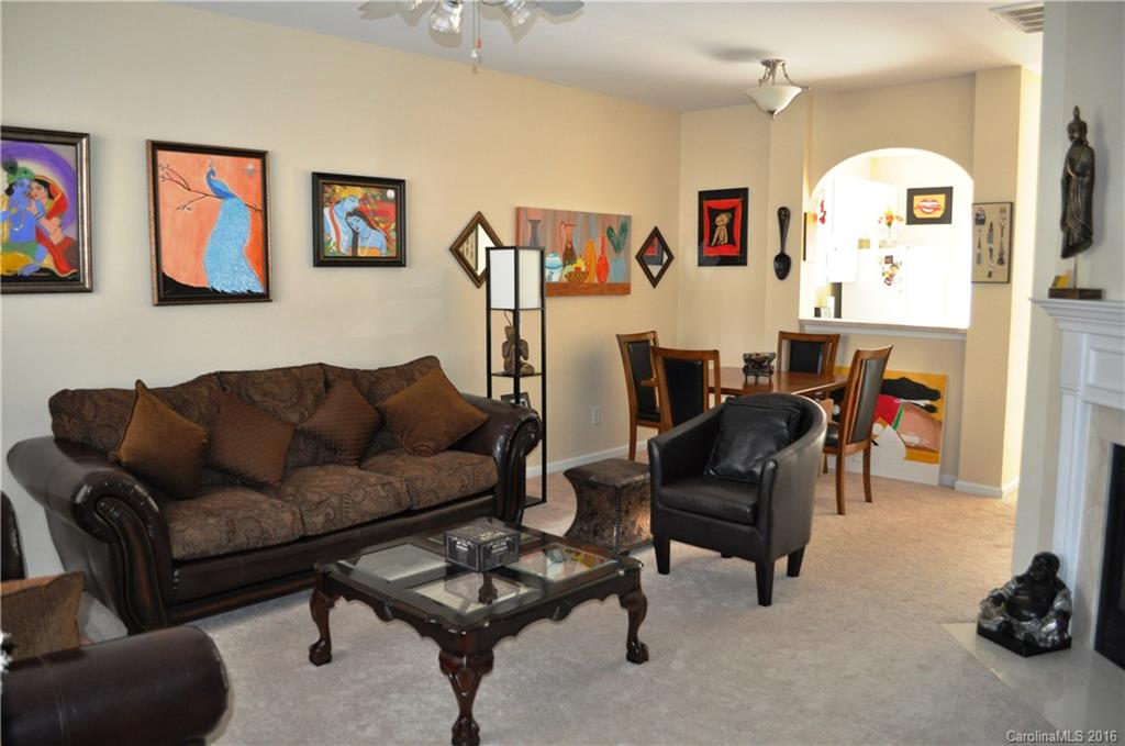 944 Copperstone Lane, Unit 165 Fort Mill, SC 29708 - Photo 3 of 18 a living room with furniture and a couch